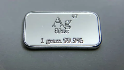 One gram of Silver bullion close up Stock Footage