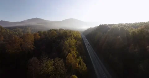 One gray silver crossover SUV car driving alone road trip, travel on freeway Vidéo 164361549