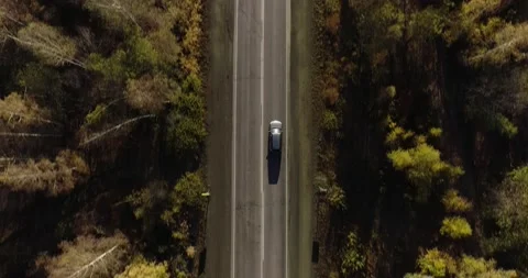 One gray silver crossover SUV car driving alone road trip, travel on freeway Stock Footage 164362209