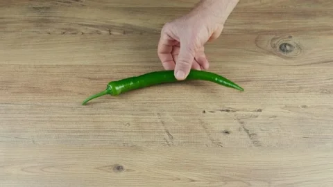 One green chilli pepper Stock Footage 168835260