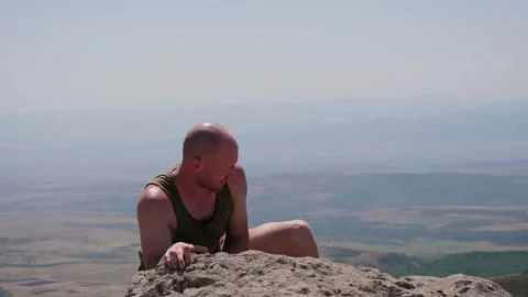 One guy is in the mountains Stock Footage 248872410