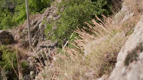 One guy is in the mountains Stock Footage 248872914