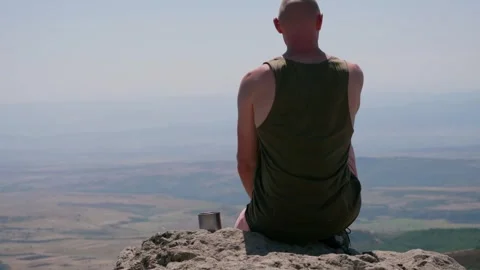 One guy is in the mountains Stock Footage 248873569