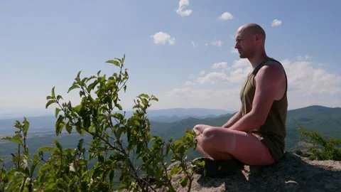 One guy is in the mountains Video stock 248887634