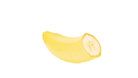 One half of banana fruit rotating. Isolated on white background. Closeup. Stock Footage 166231267