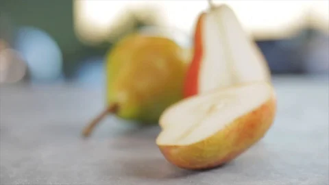One Half of a Pear Bobbing Back and Forth. Stock Footage 99137918