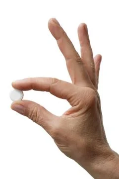 One hand holding one tablet Stock Photos