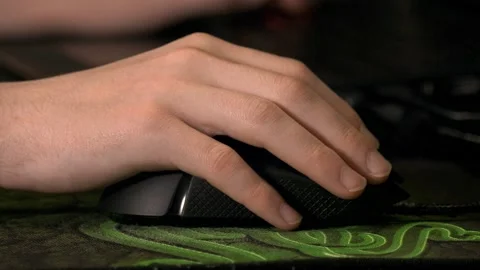 One hand on mouse in closeup Stock Footage 140477229