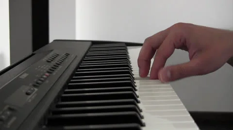 One hand playing piano 库存影片 24578676