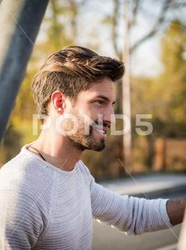One handsome young man in city setting Stock Photos