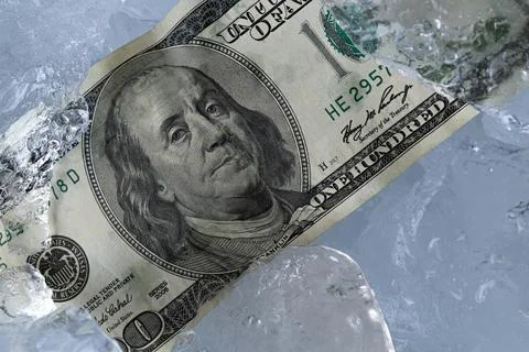 One Hundred Dollar Banknote Between Ice Blocks Stock Photos