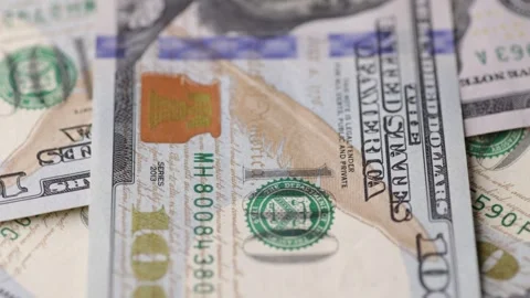 One hundred dollar banknotes rotating in tight macro closeup showing fine d.. Stock Footage 323975143