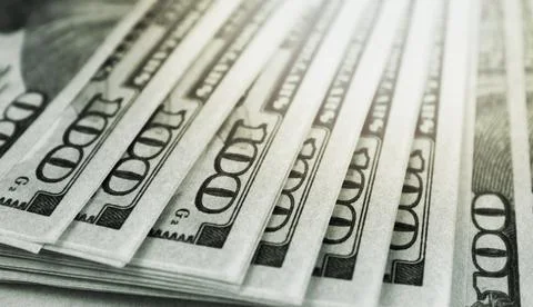 One hundred dollar bills close up. Financial and economic concept. Stock Photos