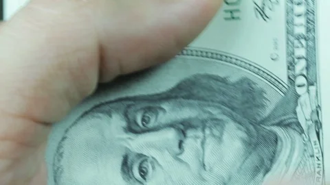 One hundred dollar bills. Stock Footage 100450213