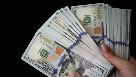 One Hundred Dollar Bills in the Hands of a Girl, Redrawing Money Stock Footage 208935763