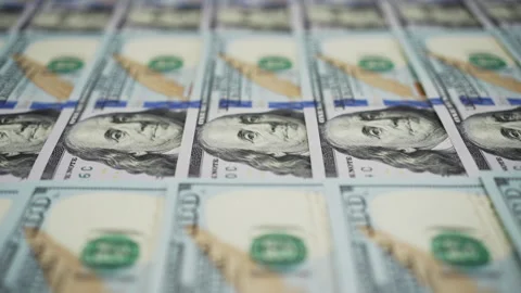 One hundred dollar bills moving horizontally from left to right Stock Footage 334046483