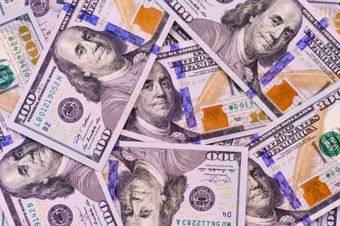 One hundred dollars. Benjamin Franklin. US dollars background. Stock Illustration