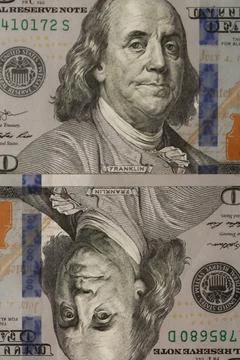 One hundred dollars mirror image, two bills of large lan, concept. Stock Photos