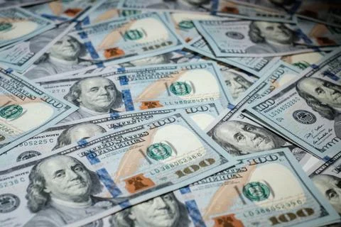 One hundred dollars pile as background Stock Photos