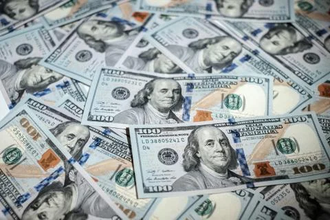 One hundred dollars pile as background Stock Photos