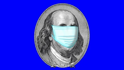 One hundred dollars portrait of Benjamin Franklin wearing Face Masks for viru Stock Footage 129850386