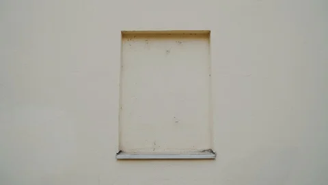 One immured window in center of stone building wall, imitation, symmetric shot 스톡 동영상 129338656