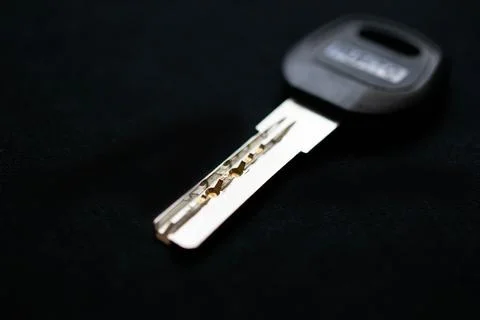 One key to the apartment on a black background.selective focusing Stock Photos