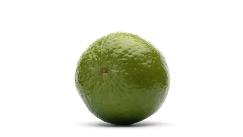One lime with water drops is rotating on the turntable. Isolated on white Stock-Footage 157046684