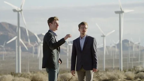 One man asserting something to the other one Stock Footage 77440715