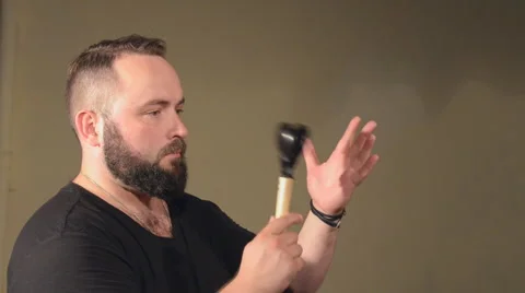 One Man With a Beard in Black T-Shirt, Playing on the Percussion Instrument Stock Footage 67105912