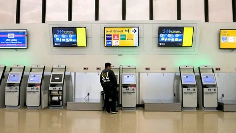One Man Carry-ons Empty Newark Airport Terminal B COVID-19 Pandemic Video stock 128337830