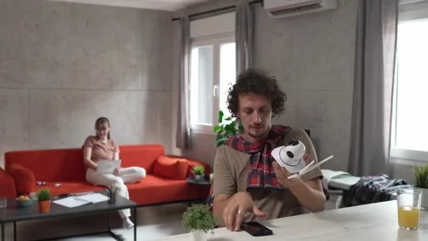 One man install setup home security surveillance camera on smartphone Stock Footage 249401200