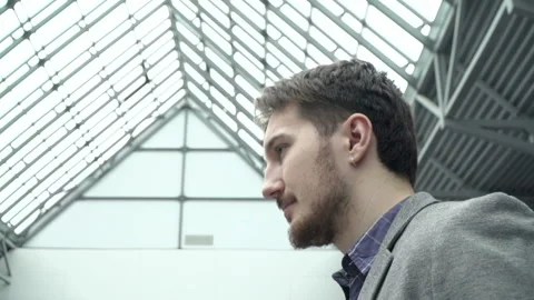 One man in jacket goes to an important financial activity. Human walks in shoppi Stock Footage 199487480