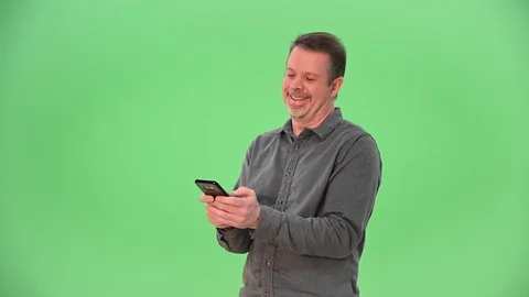 One man looking at the camera and shrugging on green screen Stock Footage 100102290