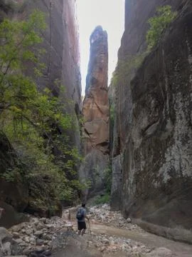 One man looking up through the narrows Stock Photos