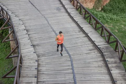 One man run jogging elevated view above high Stock Photos