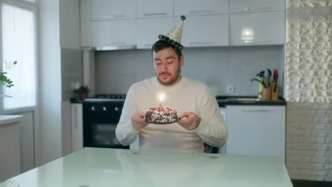 One Man Sitting Making Wish Blowing Birthday Cake Casual 스톡 동영상 333255885