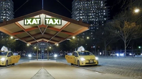 One man standing on sidewalk waiting for taxi cap at night. single person Stock Footage 46021574