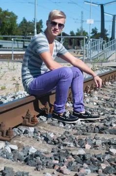 One man on train tracks Фото