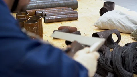 One man use special angle to measure diameter of rusty pipe on construction site Stock Footage 126356960