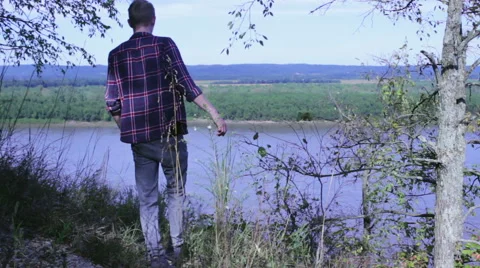 One Man Walks Into Frame To Enjoy Mississippi River View Video stock 41963294