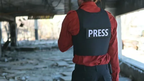 One man, war journalist with digital camera at the place of action, in war zo Stock Footage 166805135