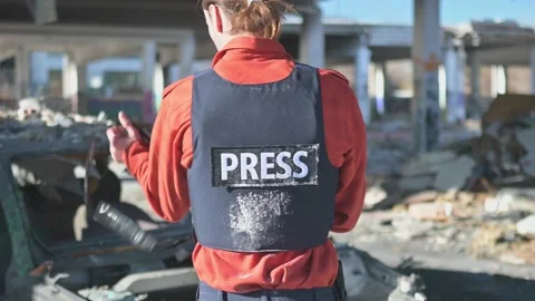 One man, war journalist with digital camera at the place of action, in war zo Video stock 166805301