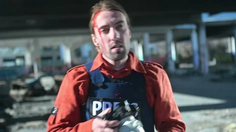 One man, war journalist with digital camera at the place of action, in war zo Video stock 166805409