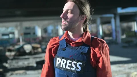 One man, war journalist with digital camera at the place of action, in war zo Video stock 166805411