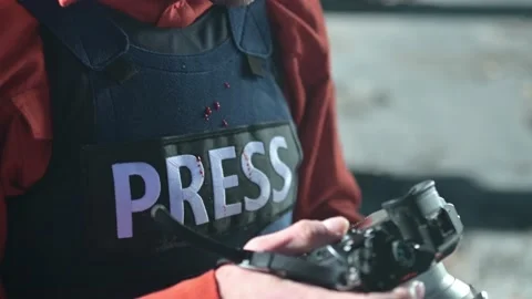 One man, war journalist with digital camera at the place of action, in war zo Video stock 166805535