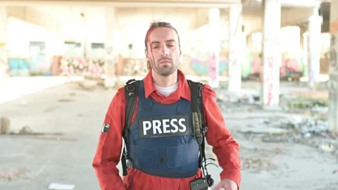 One man, war journalist with digital camera at the place of action, in war zo Video stock 166805582