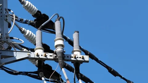 One of the many wires of the thick wires on the post in Tokyo Japan Stock Footage 121379797