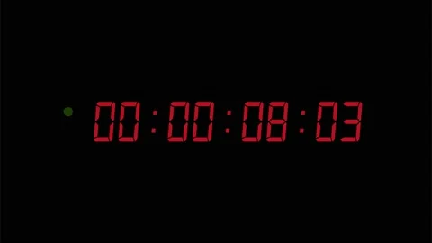 One minute of glowing led 29,97 fps timecode readout with red digits and green Video stock 133962005