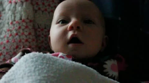 One month old tries to make noise Stock Footage 10684999
